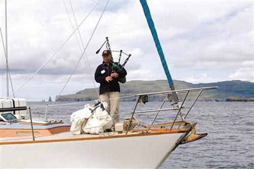 First mate and Chef Laurie pipe Galley Guys ashore. © The Galley Guys